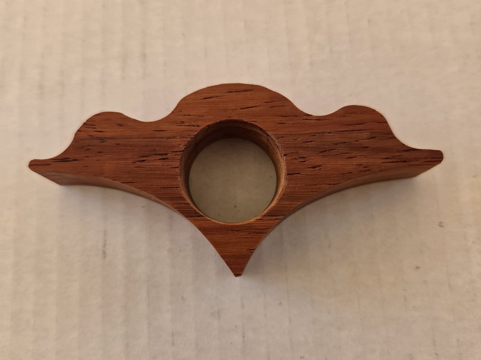 Scallop Thumb Book Holder, Padauk