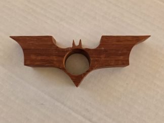 Bat thumb book holder in padauk, handmade by Gilbert