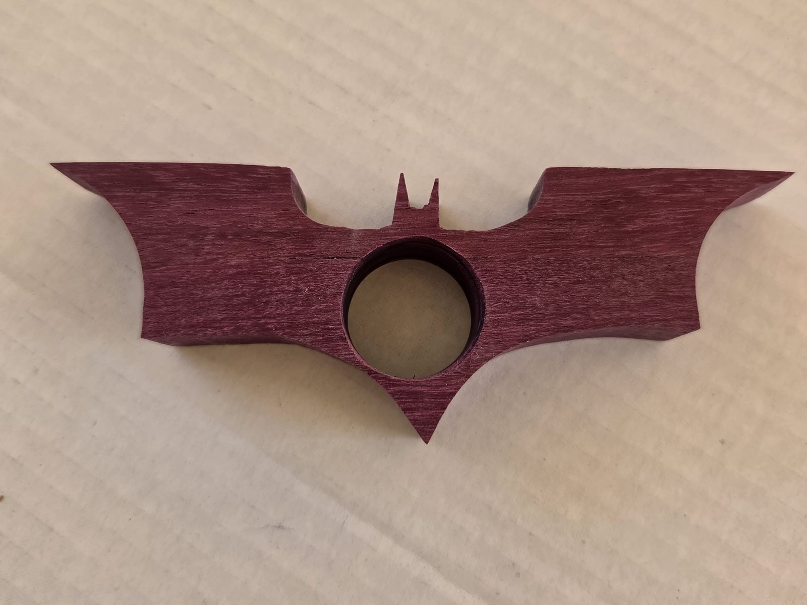 Bat thumb book holder in purpleheart, second view